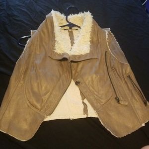 Faux fur and leather mini vest